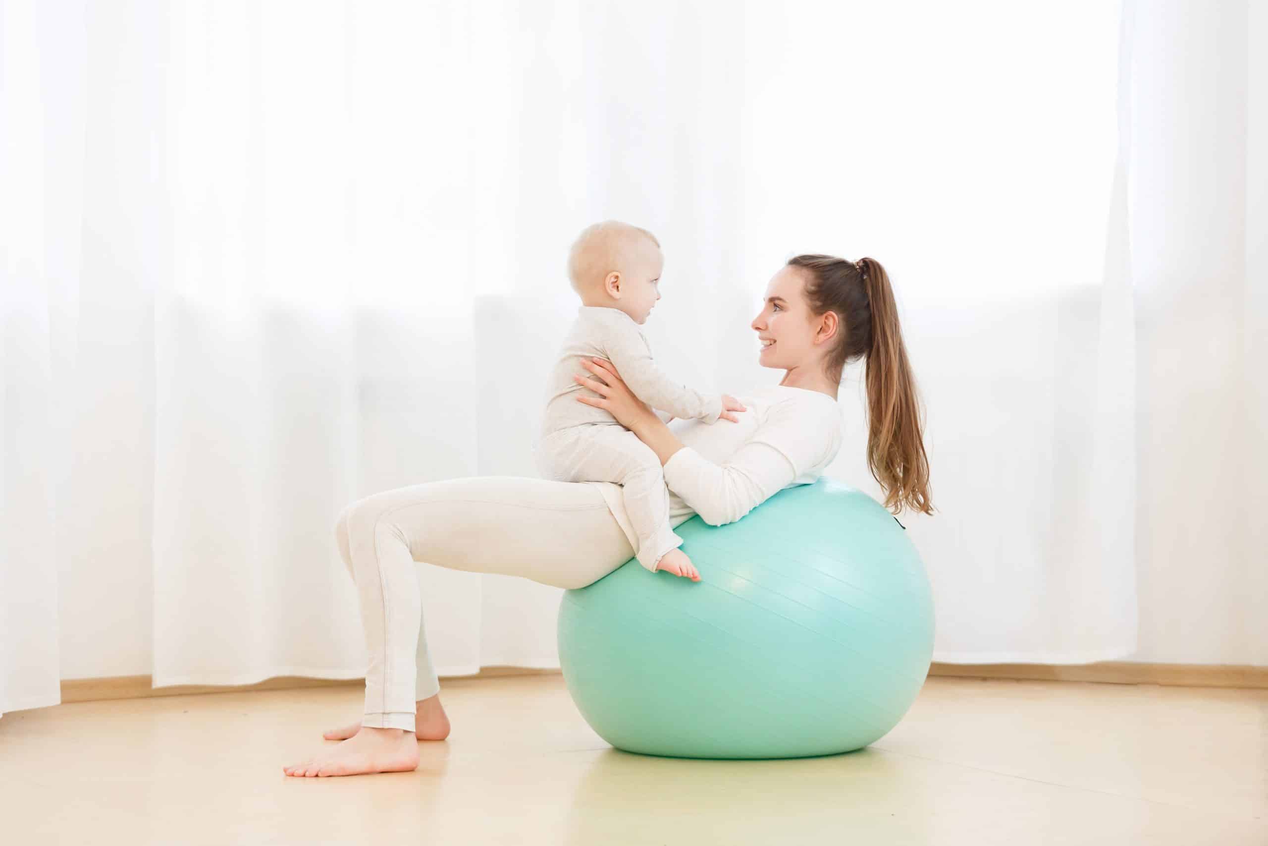 Mum working out with baby. New Year's Resolutions for Parents