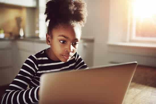 Child watching laptop