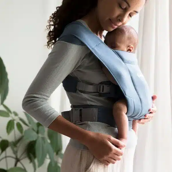 lady with newborn in Ergobaby Embrace baby carrier